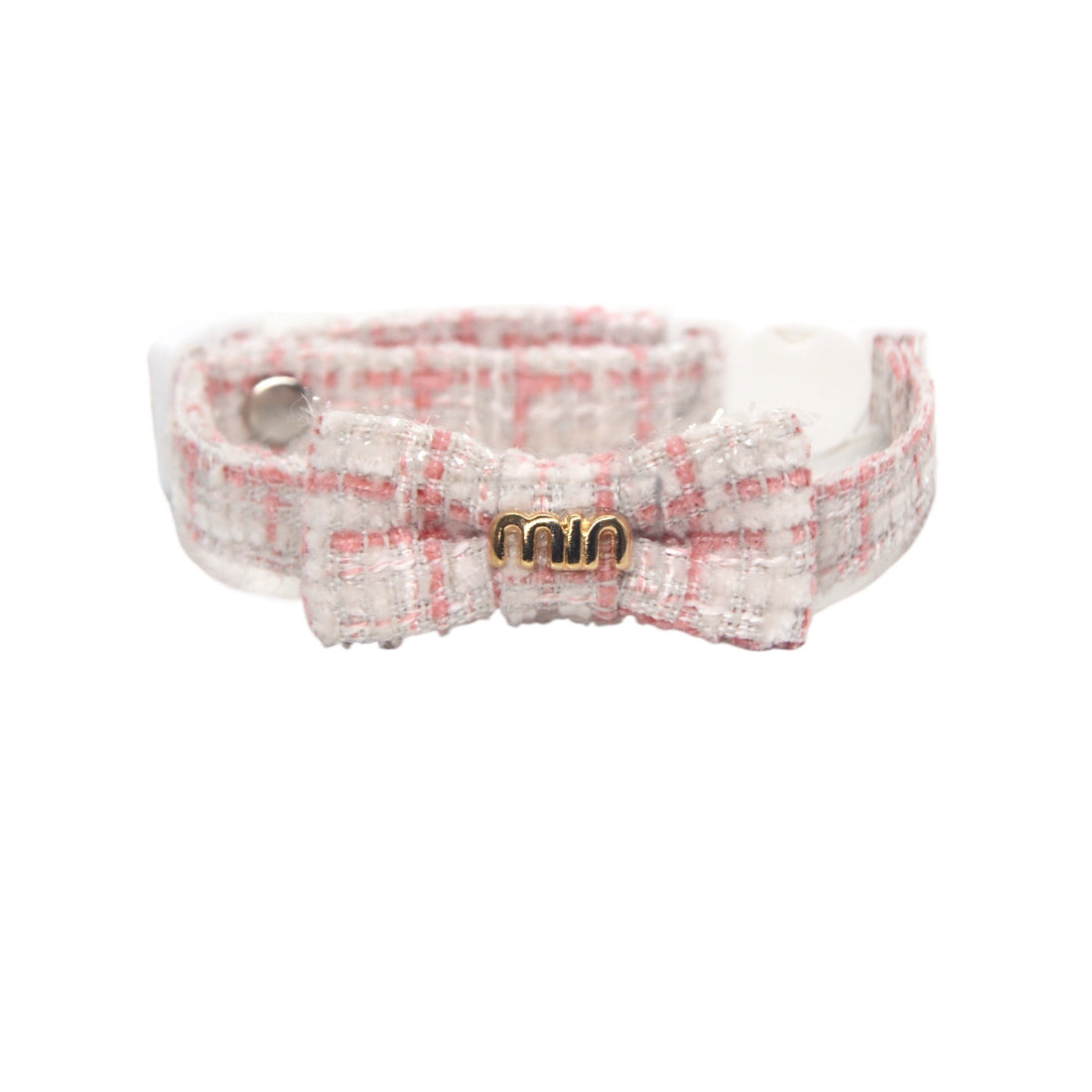 Close-up of Mokka textured bow cat collar in brown with adjustable strap and metal buckle