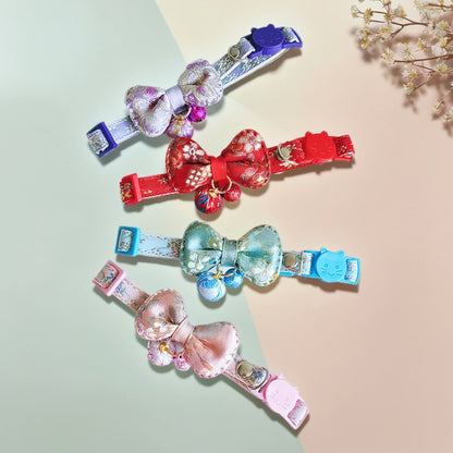 Mokka Bow Charm Cat Collar with bell displayed against a neutral background