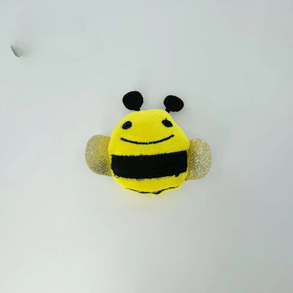 Moo plush insect cat toy held in hand showing size and softness
