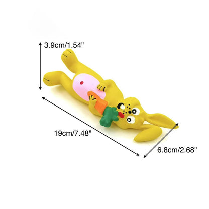 Petkin Squeaky Bunny Dog Toy held in hand displaying size and carrot shape
