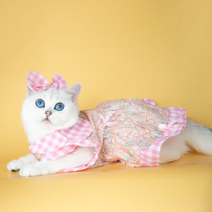 Top view of Ozzie dog dress with floral print and bow detail
