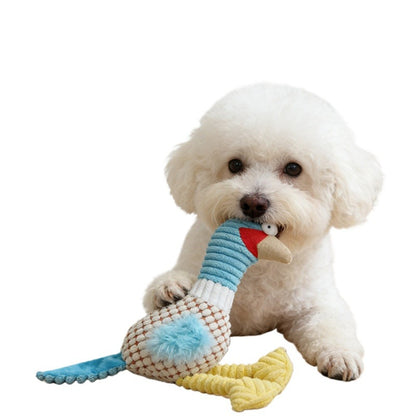 Side view of Petkin duck plush dog toy highlighting long legs and orange feet