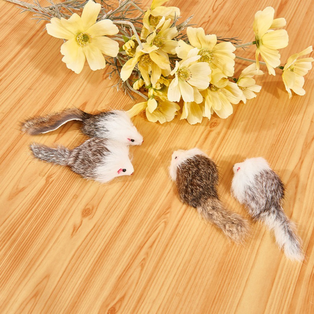 Moo faux fur mouse cat toy shown from above on a white background