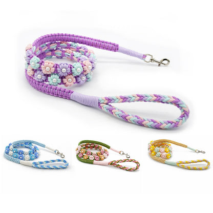 Loofie floral braided dog leash coiled on white background
