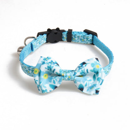 Side view of Mokka floral bow tie cat collar with bell attached