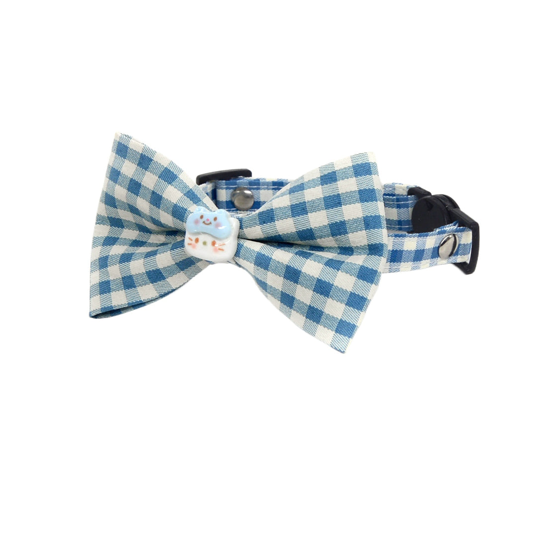 Mokka cat collar worn by a cat, highlighting the bow and charm on brown collar
