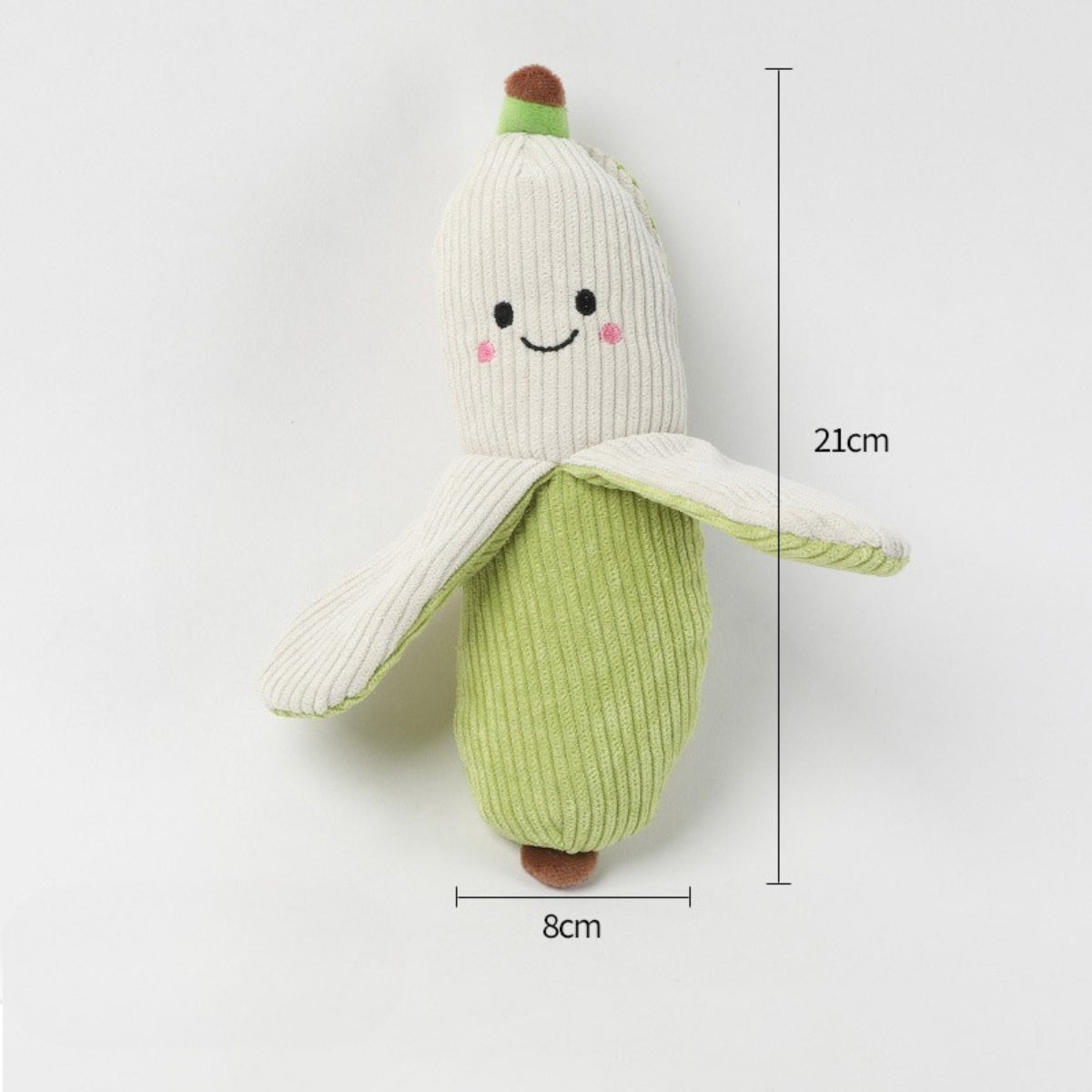 Petkin plush carrot dog toy with green leafy top and orange body for dogs to chew