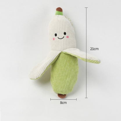 Petkin plush carrot dog toy with green leafy top and orange body for dogs to chew
