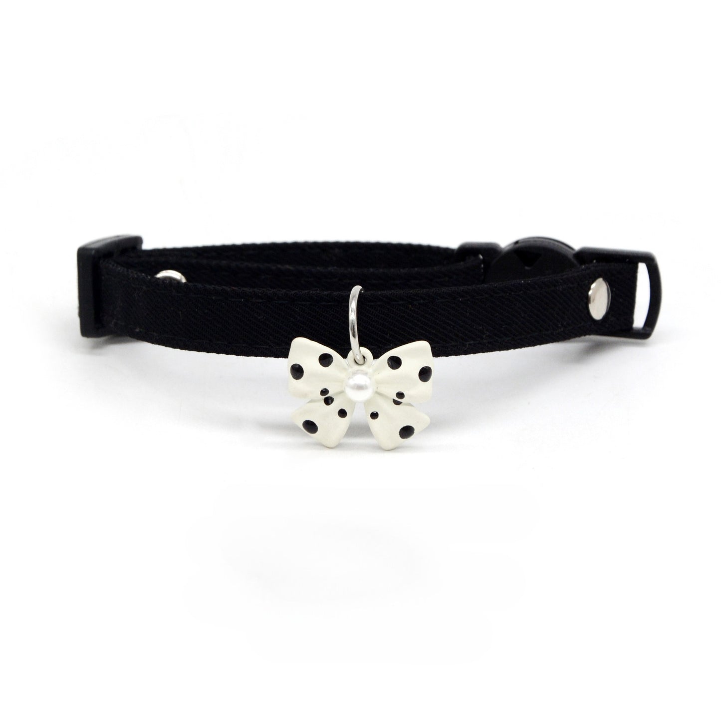 Mokka Polka Dot Bow Charm Breakaway Collar displayed flat with black and white polka dot pattern