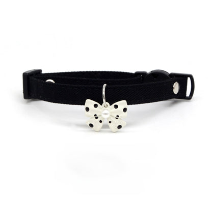 Mokka Polka Dot Bow Charm Breakaway Collar displayed flat with black and white polka dot pattern