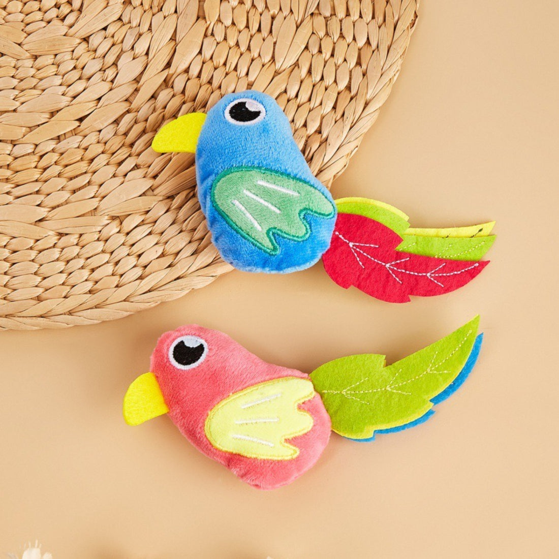 Close-up of Moo bright bird plush toy designed for cat play