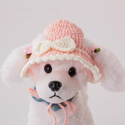 Ozzie pink crochet cat hat worn on a mannequin head