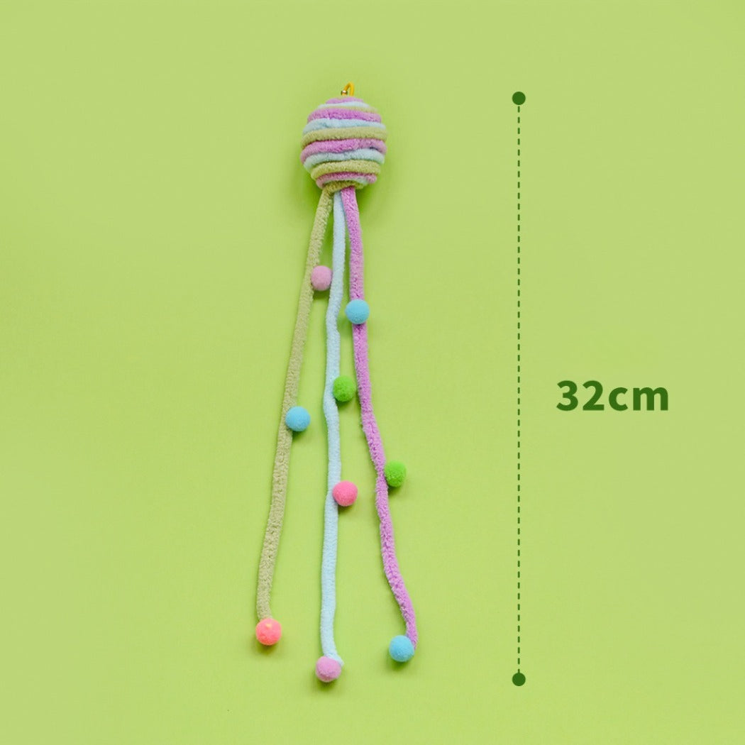Moo colorful interactive toss cat toy shown from a side angle emphasizing its shape