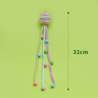 Moo colorful interactive toss cat toy shown from a side angle emphasizing its shape