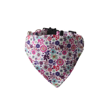 Close-up of Mokka floral cat bib featuring a small bell attached
