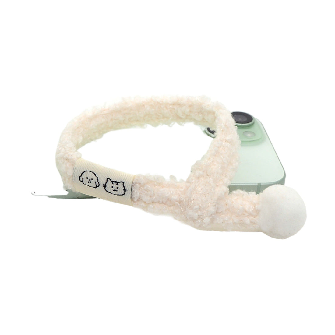 Mokka cat collar displayed flat highlighting the pom pom and buckle