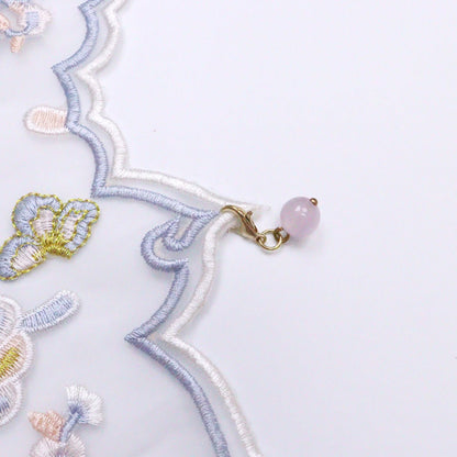 Mokka butterfly embroidered cat collar displayed with focus on embroidery details