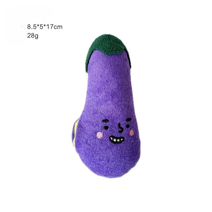 Petkin plush dog toy shaped like a red radish with green leaves