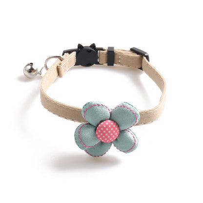 Close-up of Mokka floral cat collar highlighting the breakaway safety feature