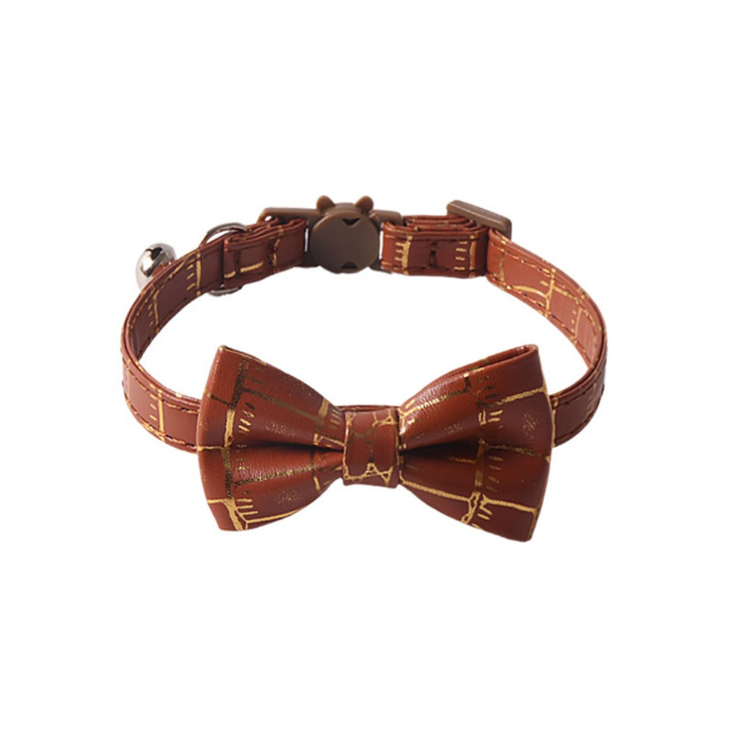 Mokka elegant bow tie cat collar shown from above on a plain surface