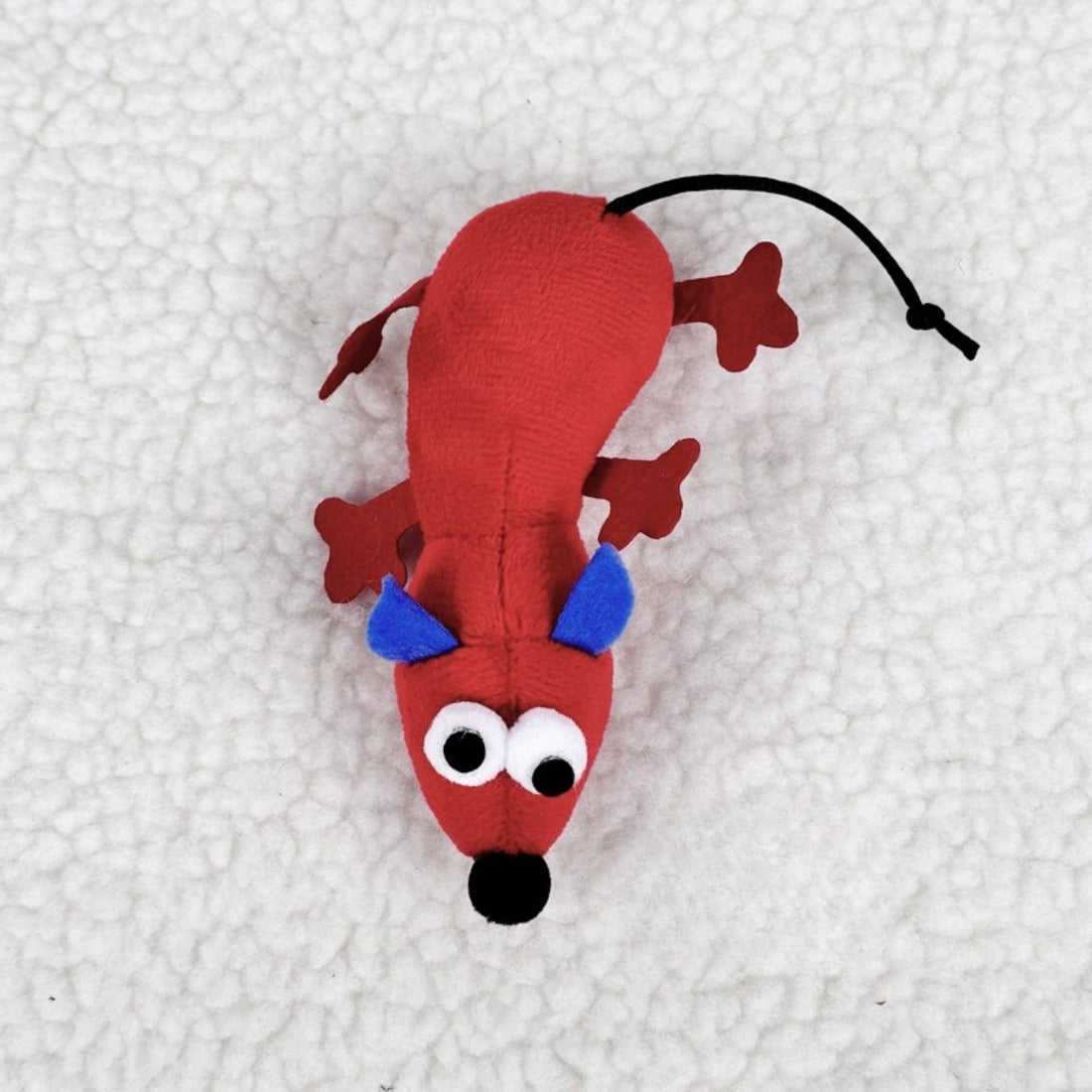 Moo mouse cat toy with cow pattern and pink nose on a white background