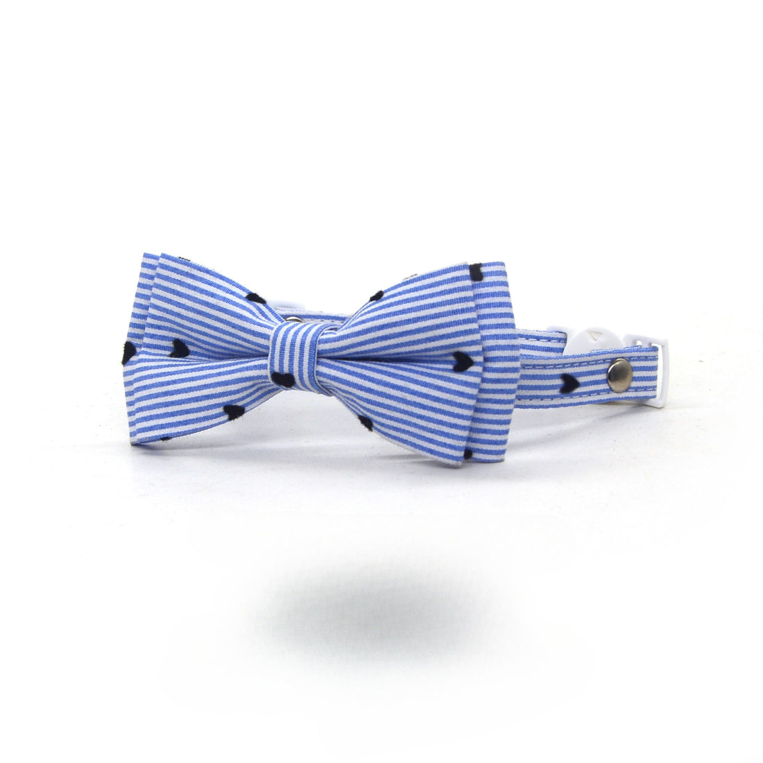 Cat wearing Mokka striped bow breakaway collar showing fit and style