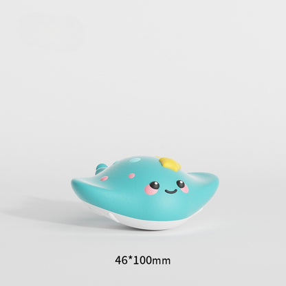 Petkin Ocean Animal squeaky dog toy with whale face and fins visible