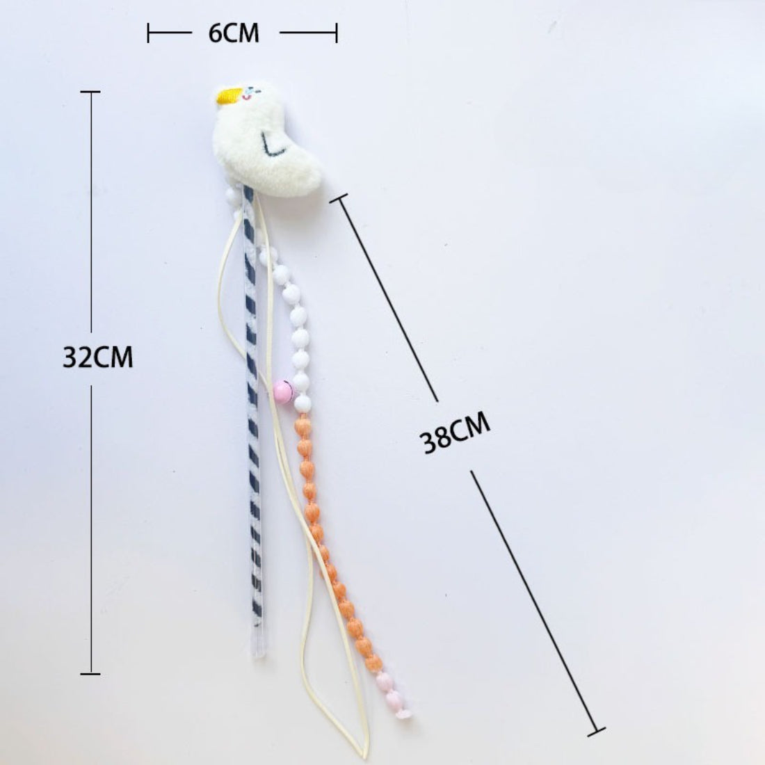 Moo plush cat teaser wand with beads displayed on wooden surface