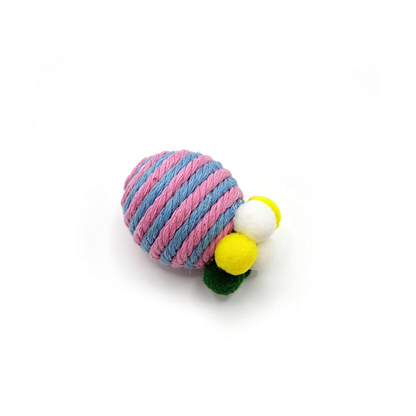 Blue cat toy with blue and pink striped wrapping and multicolored pom-poms