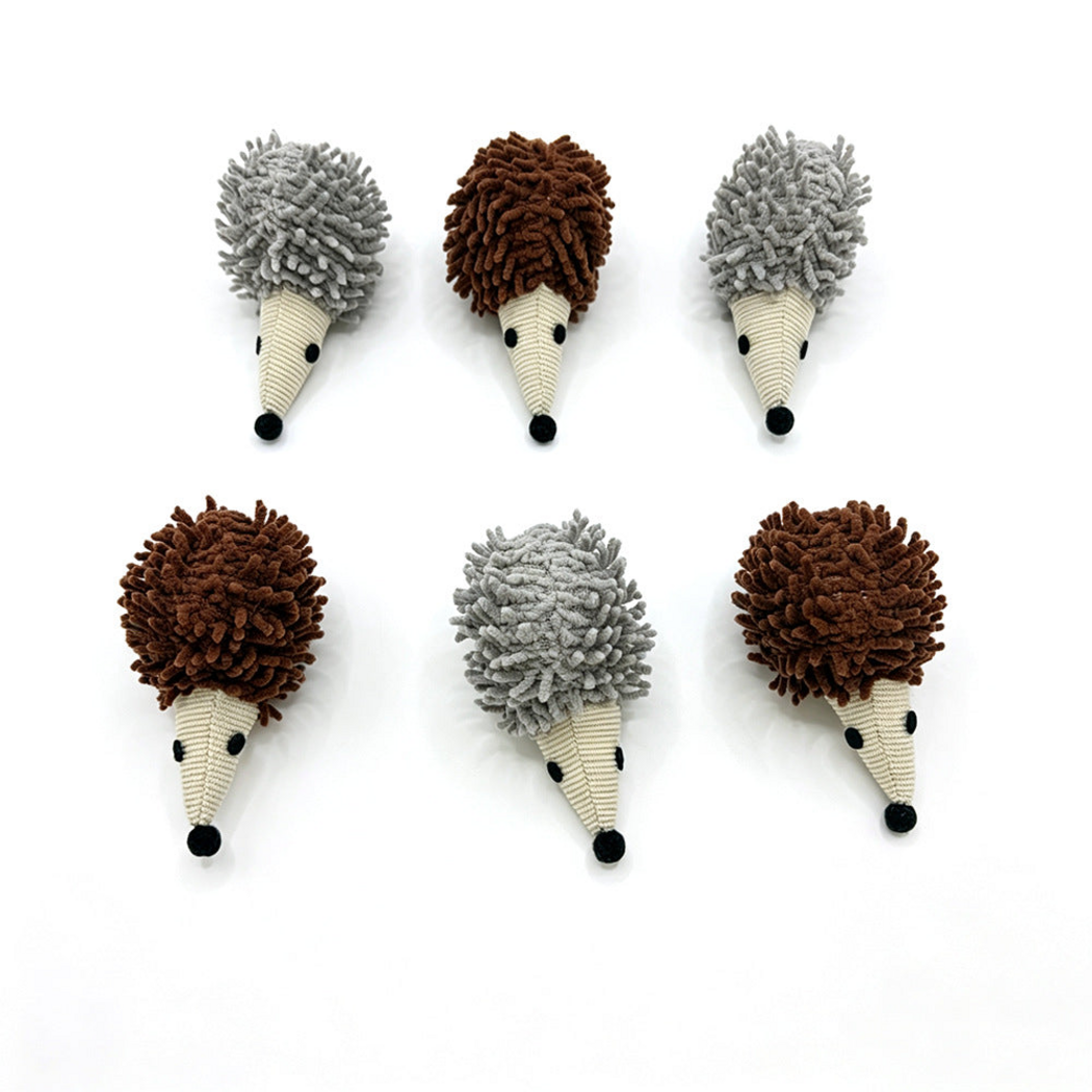 Gray and Brown hedgehog cat toys arranged in two rows on white