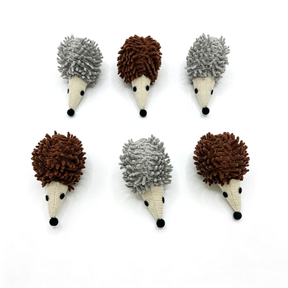 Gray and Brown hedgehog cat toys arranged in two rows on white