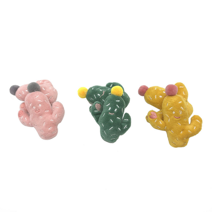 Pink, Green and Yellow cactus-shaped cat toys displayed together