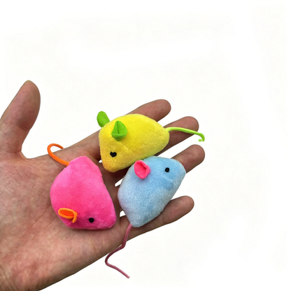 Yellow, Pink and Blue mouse-shaped cat toys held in a hand