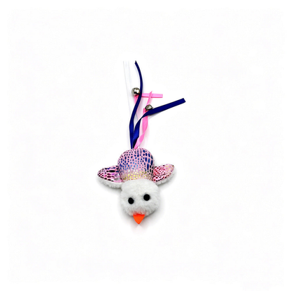 Pink bird-shaped cat toy with blue dots, white head, ribbons and bells