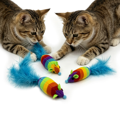 Rainbow-striped mouse-shaped cat toys with blue feather tails beside two tabby cats