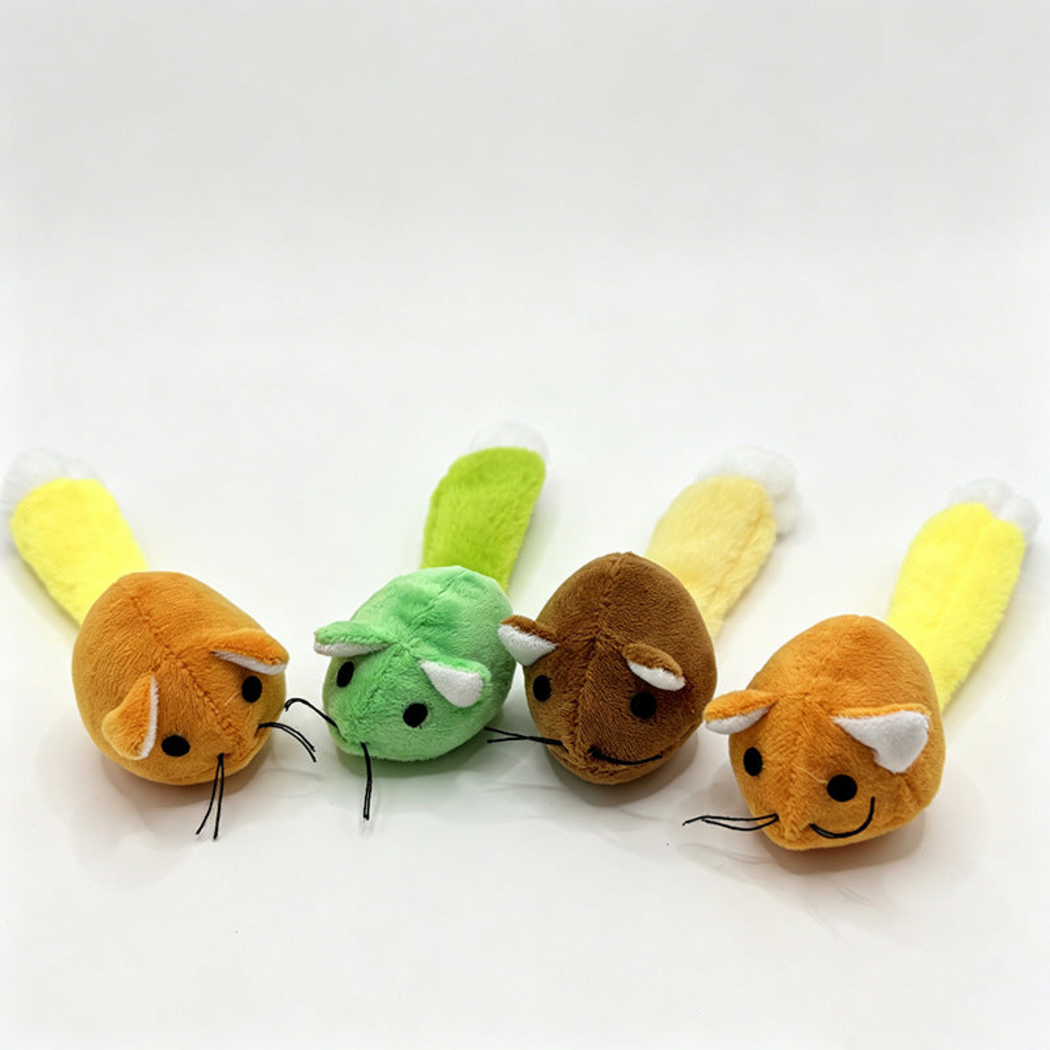 Mouse-shaped cat toys in Green, Orange and Brown, viewed at an angle