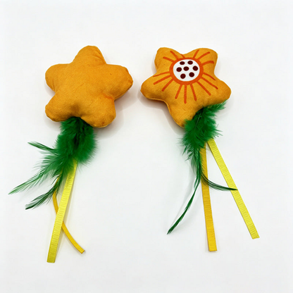 Flower cat toys showing the patterned front and plain yellow-orange reverse