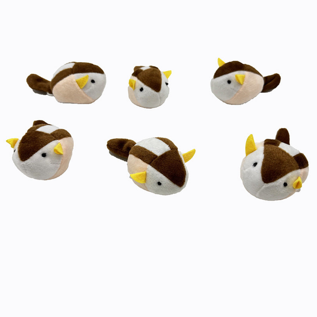 Squirrel-shaped cat toys at side and front angles with yellow ears and cream side panels