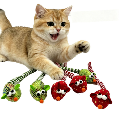 Cat reaching toward Red and Green mouse cat toys with striped tails