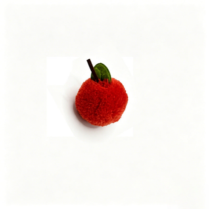 Orange Red Orange ball cat toy with a dark stem and green leaf