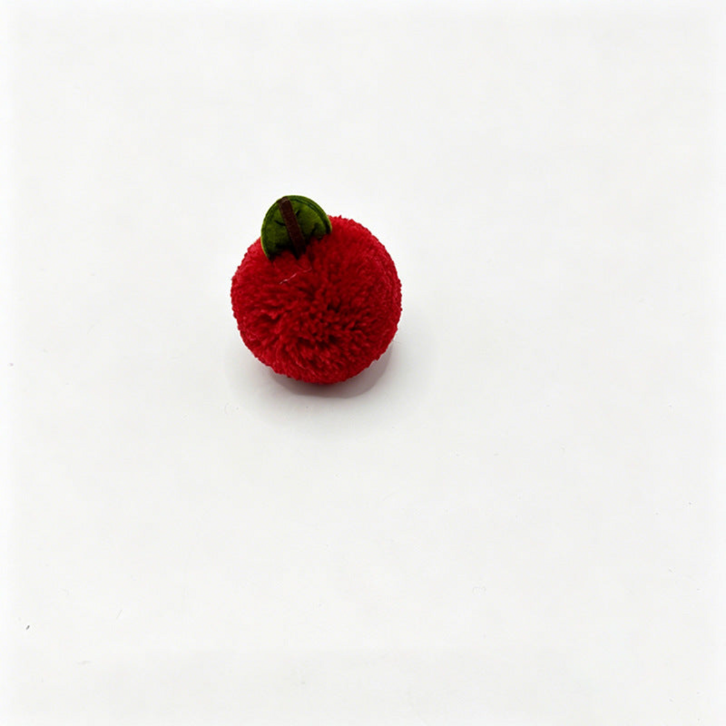 Red Apple ball cat toy with a green leaf and short dark stem