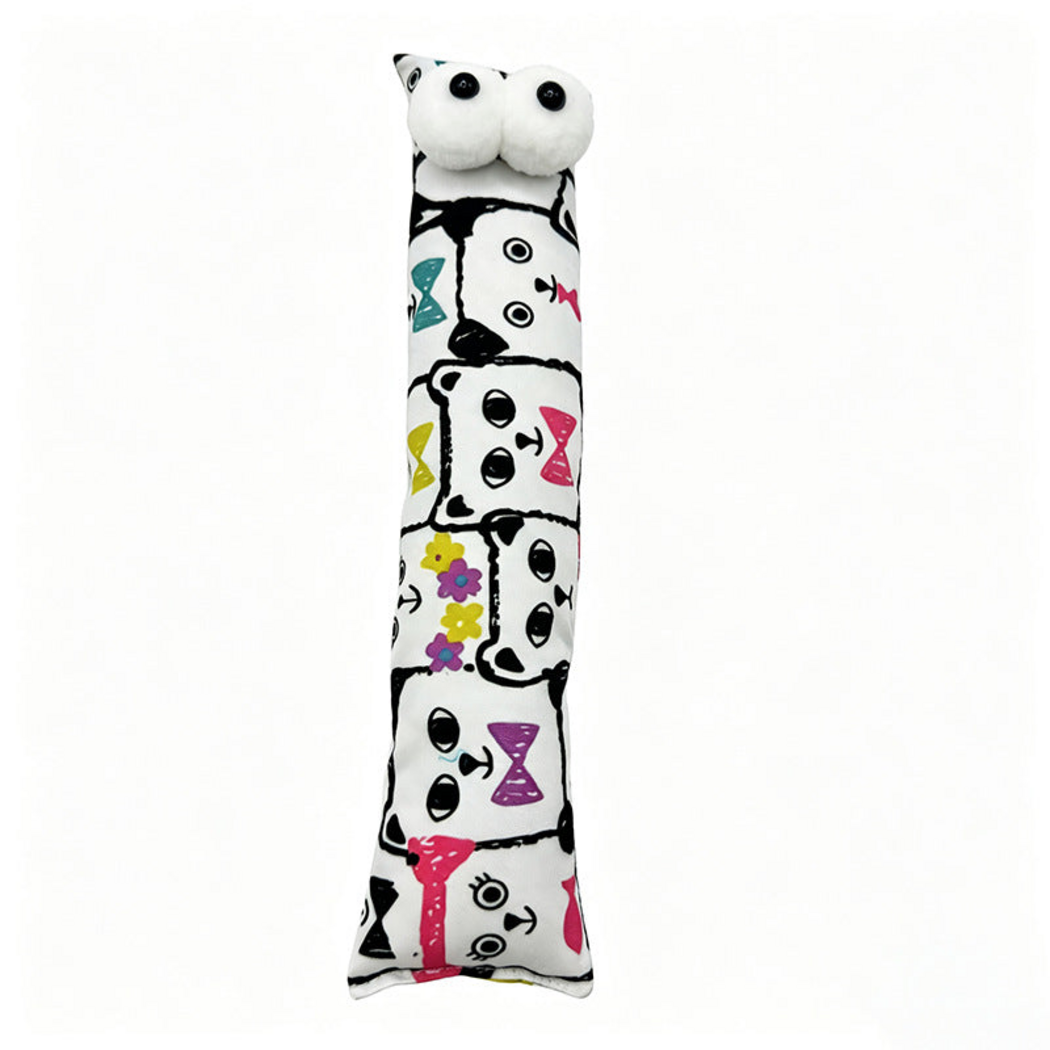 Black pillow cat toy with cartoon cat faces, colorful bows and two white eyes