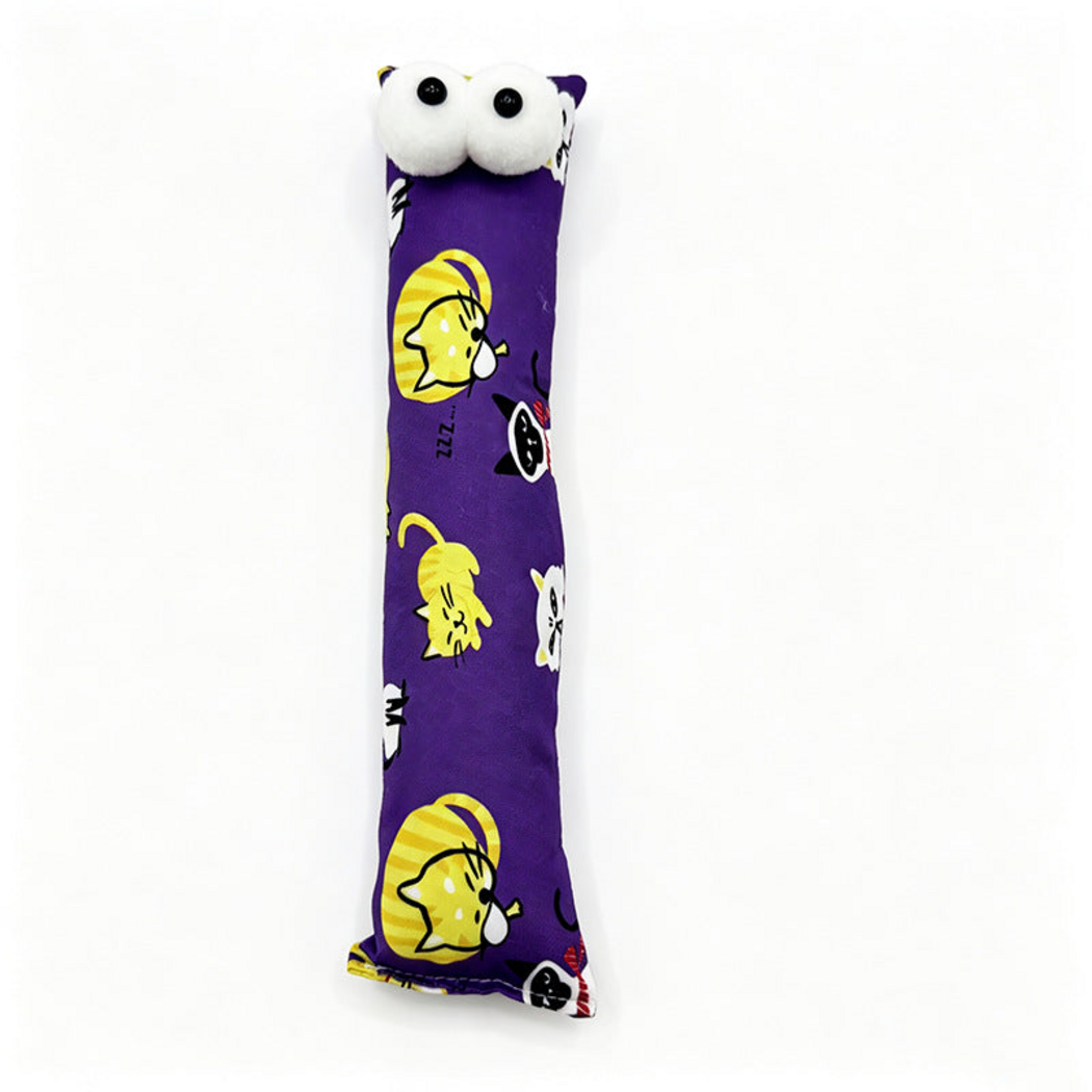 Purple pillow cat toy with yellow cartoon cats and two white eyes