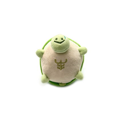 Green turtle-shaped cat toy with original embroidered belly