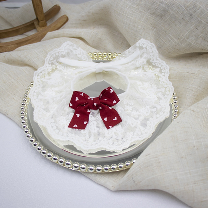 Burgundy Pet Neckwear with a white heart-patterned bow and white lace-look bib