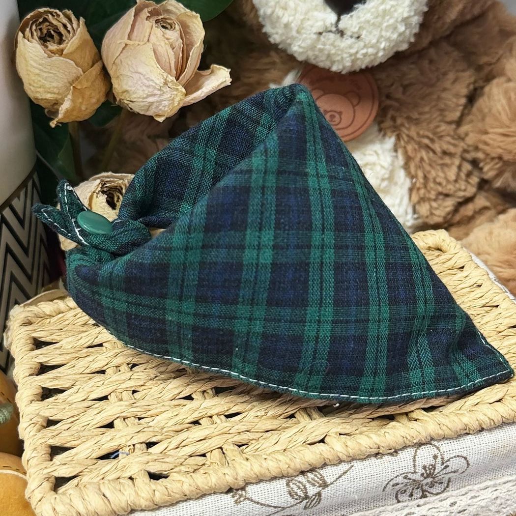 Green plaid triangular pet neckwear with a green snap and contrasting edge stitching