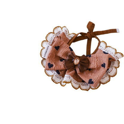 Hearts Pet Neckwear with brown ties, a layered bow and scalloped edging on white