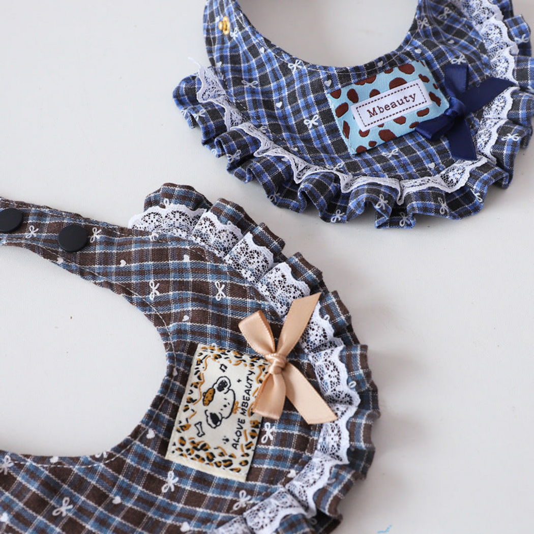 Close-up of Blue and Brown plaid Pet Neckwear showing bows, lace-look edging and snap fasteners