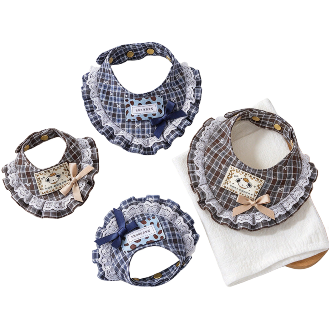 Blue and Brown plaid Pet Neckwear displayed with closed snap straps, bows and white lace-look edging