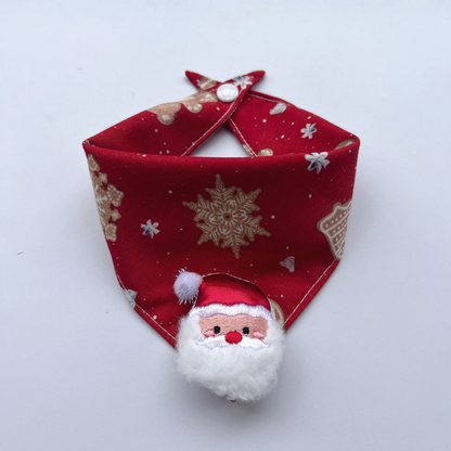 Santa pet neckwear with red patterned bandana, white snap and raised Santa face charm